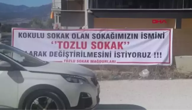 TOZDAN ŞİKAYET EDEN MAHALLELİ YOL KAPATTI