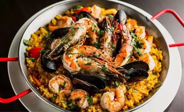 Paella tarifi! 23 Temmuz Masterchef Paella nasıl yapılır? Paella yemek tarifi! Paella için gerekli malzemeler nelerdir?