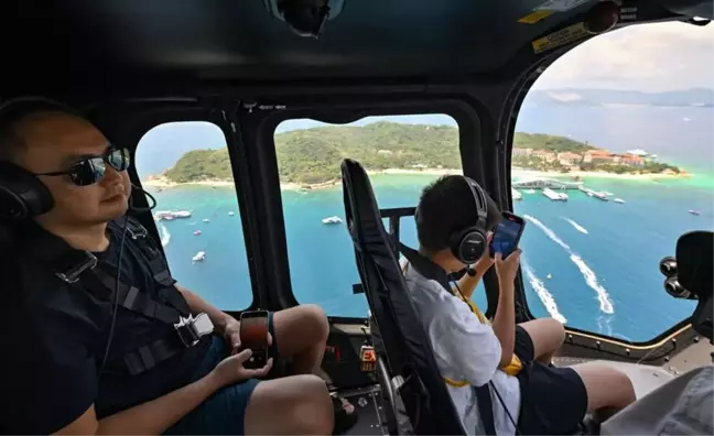 Hainan'da Helikopter Turları ile Yeni Turizm Deneyimi