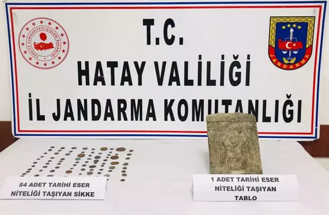 Hatay'da otomobilinde 84 sikke ve taş tablo bulunan zanlıya gözaltı