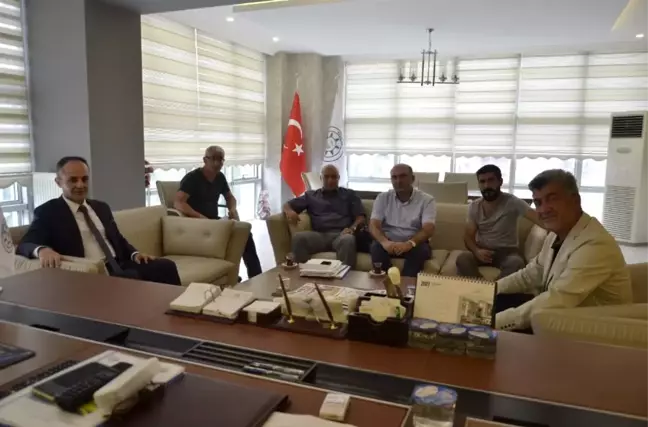 Kapusuz'dan Başkan Yiğit'e Ziyaret