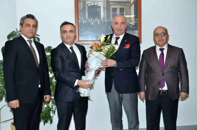 Erzurum Vergi Dairesi Başkanı Selahattin Atabek, Erzurum Ticaret ve Sanayi Odası'nı ziyaret etti