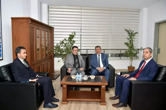 Başkan Gürkan, Kadastro İl Müdürü Onur Sadioğlu'nu ziyaret etti