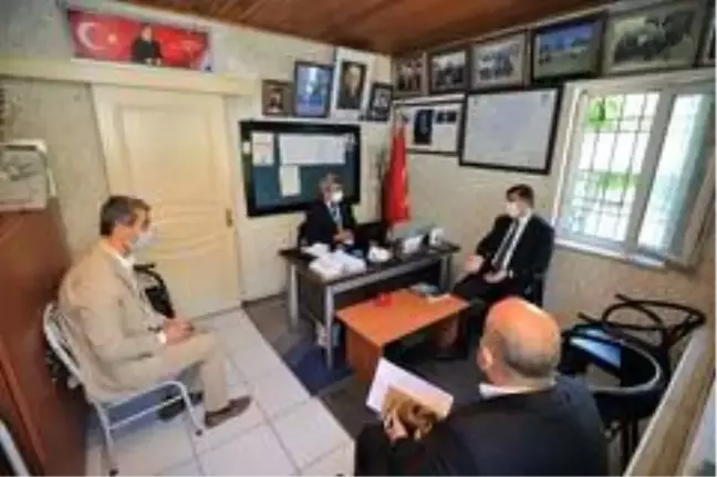 Fadıloğlu'ndan muhtarlara ziyaret