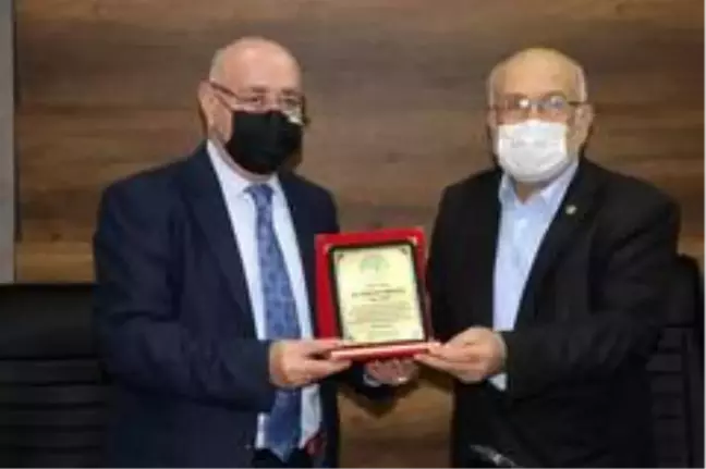 Hayırsever iş adamları ve esnafa plaket