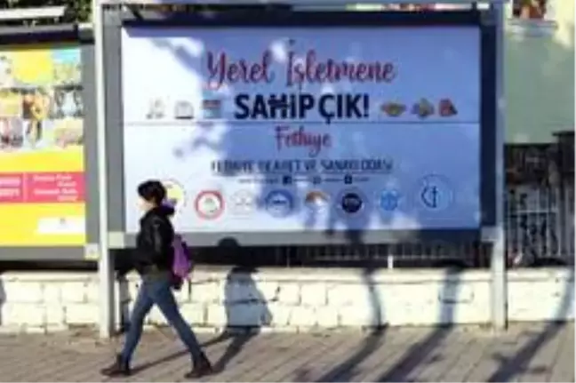 Fethiye, 'Yerel İşletmene Sahip Çık' afişleriyle donatıldı