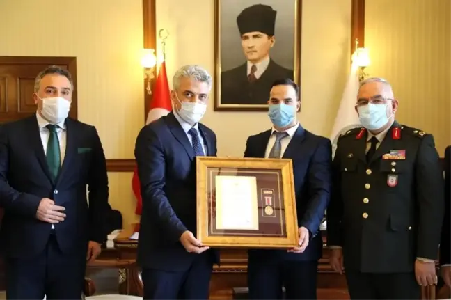 Gazi Ufuk Ağaç'a Devlet Övünç Madalyası ve Beratı taktim edildi