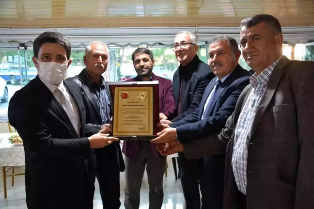Kaymakam Bayraklı'ya 'fahri hemşehrilik beratı' verildi