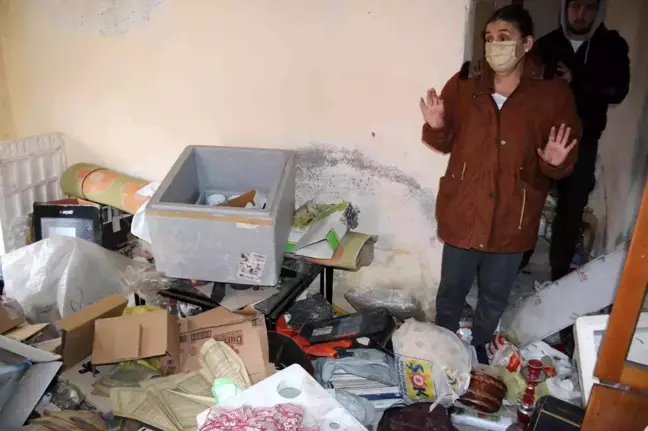 Tehditlerden korktuğu için 1 yıl sonra gelebildiği evini talan edilmiş halde buldu, gözyaşlarına boğuldu