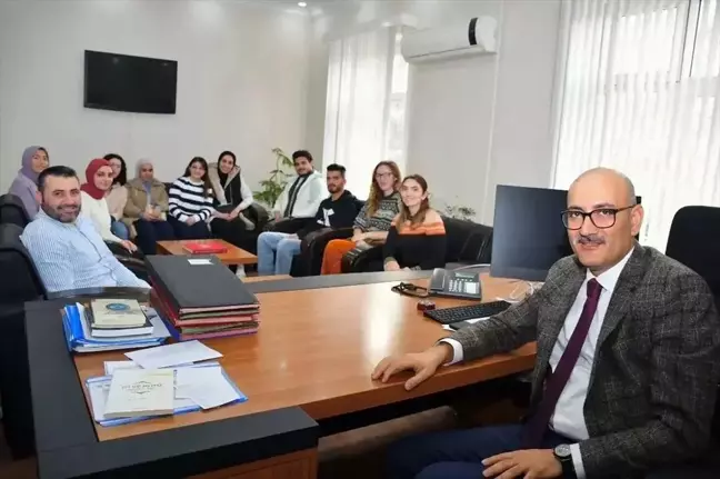 SORGED Yönetim Kurulu Başkanı Halil Uğuz, yabancı gençlerle Kaymakam Aydın'ı ziyaret etti