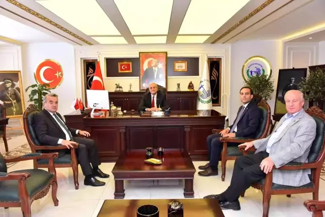 Kaymakam Öztürk ve Kaymakam Refiki Başkan Bakkalcıoğlu'nu ziyaret etti