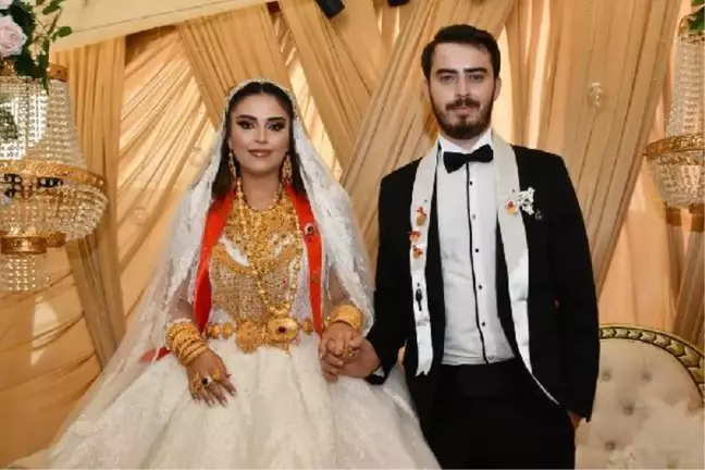 Hakkari'deki düğünde 5 kilo altın takılan gelin, halay çekerken zorlandı