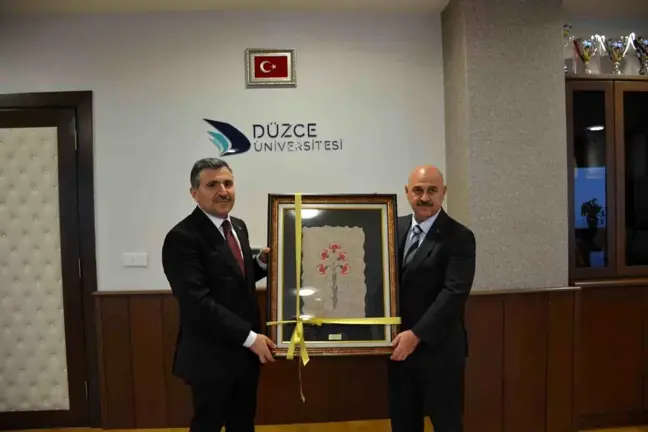 Vali Cevdet Atay, Düzce Üniversitesi Rektörü Prof. Dr. Nedim Sözbir'e veda ziyareti düzenledi