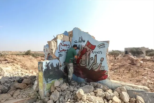 Suriyeli Grafiti Sanatçısı Fas Depremi İçin İdlib'de Duvar Resmi Yaptı
