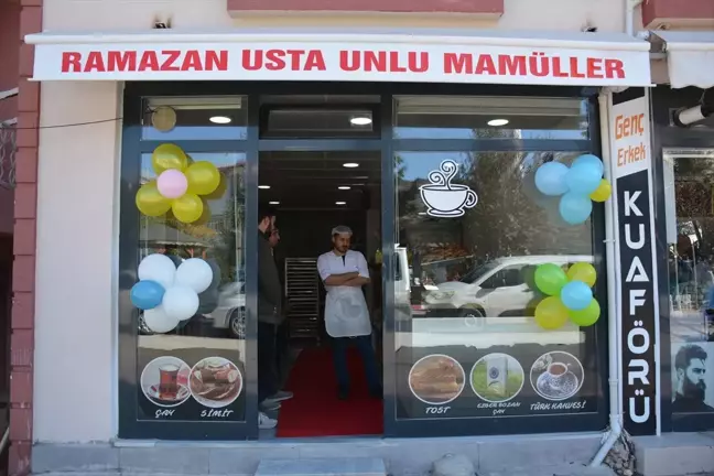 Başçiftlik Kaymakamı Satış, iş yeri açılışına katıldı