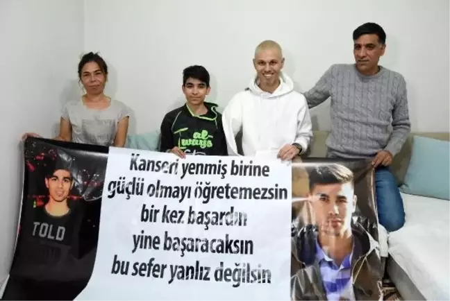 Tümörlü kolu kesilen Adil'e, pankartlı ve tezahüratlı karşılama