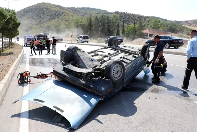 Takla atan otomobilden burnu bile kanamadan kurtuldu