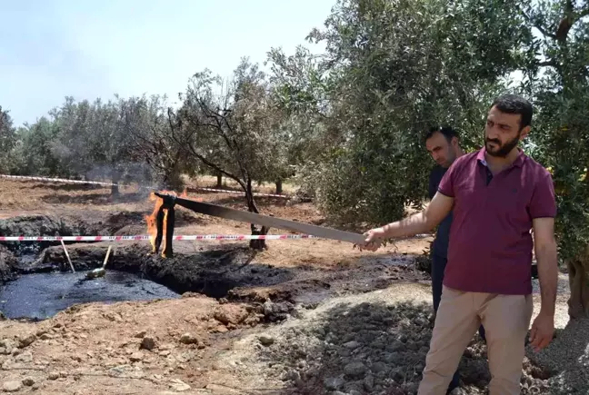 TPAO, Manisa'da bir bahçedeki kuyudan akan petrole benzer siyah sıvıdan numune aldı