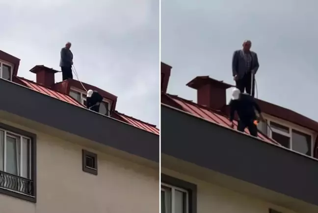 Çatı tadilatı yapan işçi beline ip bağlayarak güvenlik önlemi aldı