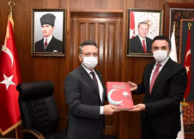 Vali Aksoy'a, İl Müdürü Turan'dan anlamlı katalog