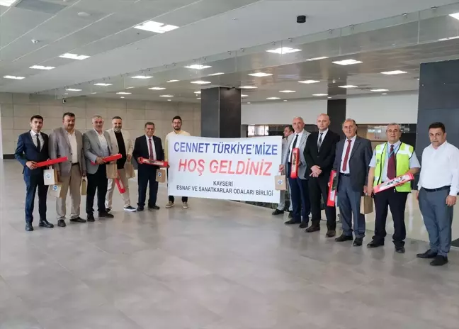 Kayseri'ye gelen gurbetçiler çiçeklerle karşılandı