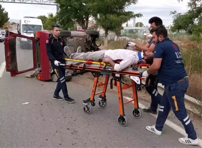 Devrilen otomobilin sürücüsü yaralandı