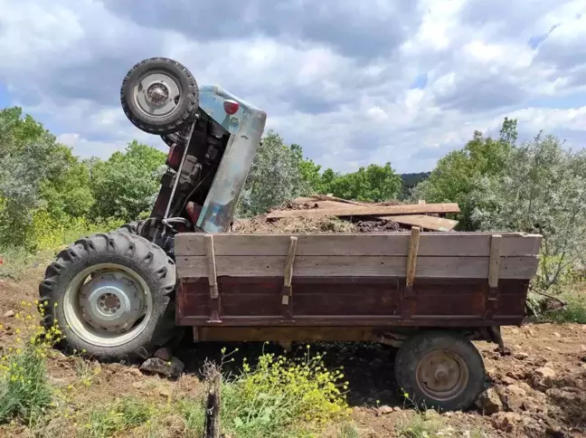 Traktörle römorku arasına sıkışan kadın yaralandı