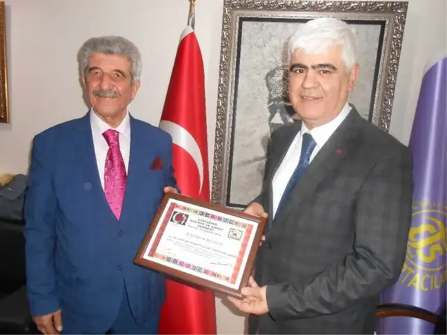 Esküder'den Tuhafiyeciler Odası Başkanı Sefa Şen'e