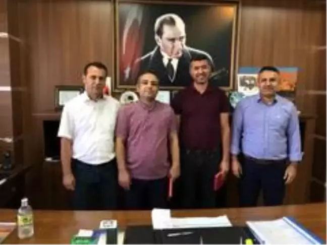 Tayini çıkan şube müdürlerine plaketli veda