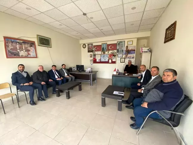 AK Partililer 'den mahalle muhtarlarına ziyaret