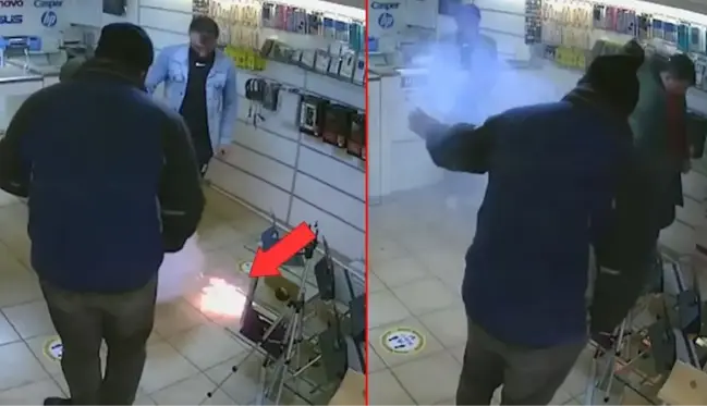 Uyarılara aldırış etmeyen müşteri az daha canından oluyordu! Telefon bataryasının bomba gibi patladığı anlar kamerada