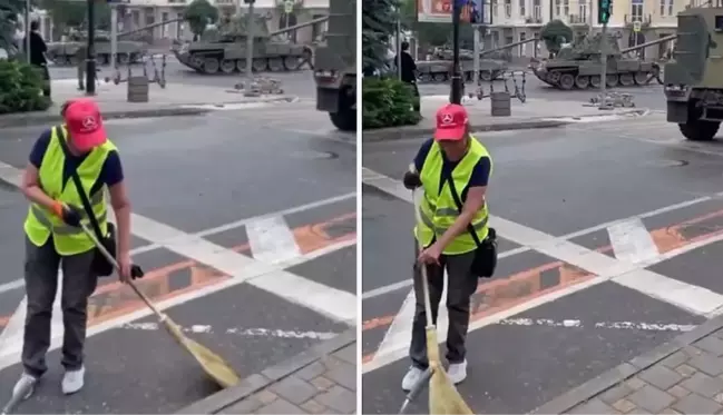 Rusya'da isyan başlatan Wagner'in işgal ettiği Rostov'dan ilginç görüntü! Kimi yolu süpürdü, kimi kolunu bağlayıp tankları izledi