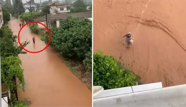 Selin etkili olduğu Bursa'nın İznik ilçesinde bir kişi göle dönen sokakta duş aldı