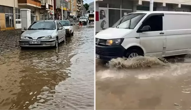 Adana'nın Tufanbeyli ilçesinde aniden bastıran yağmur nedeniyle yollar göle döndü