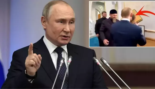 Putin, Çeçenistan'da kendisine hediye edilen Kur'an-ı Kerim'i öptü