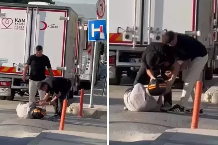 İzmir'de motosiklet sürücüsüne saldırı! Yolun ortasında böyle darp ettiler