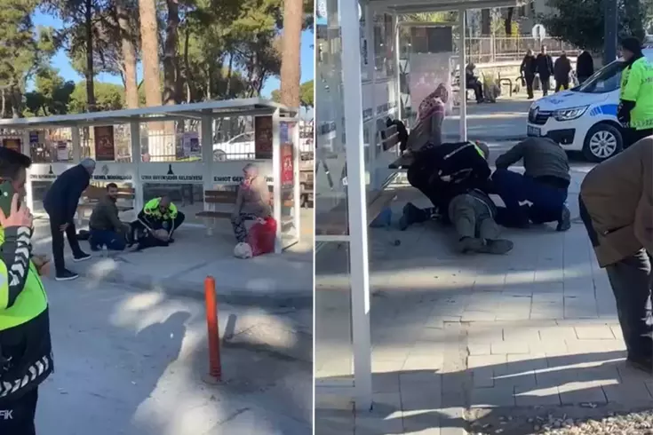 Otobüs durağında yere yığılan yaşlı adamı hayata polis döndürdü