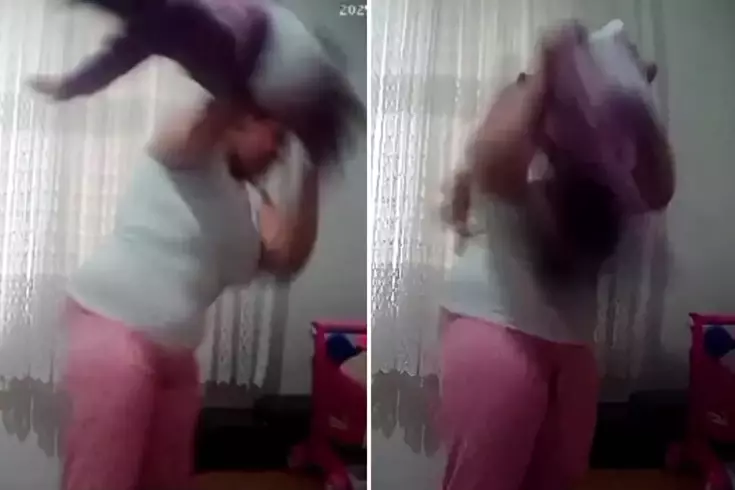 Mother violence on camera against a 1-year-old baby.