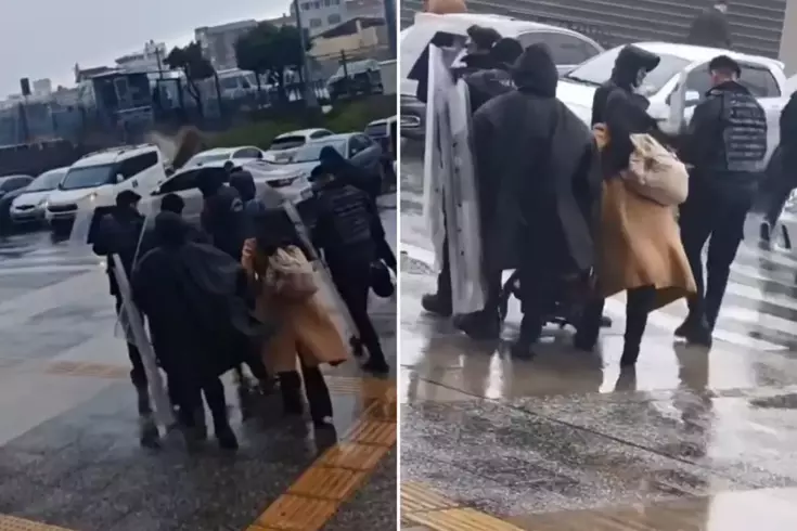 Fırtınada yürüyemeyen bebekli annenin imdadına Çevik Kuvvet yetişti