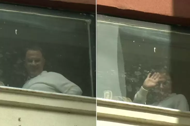 Ameliyat masasına yatacak olan Murat Çalık hastane camından el salladı