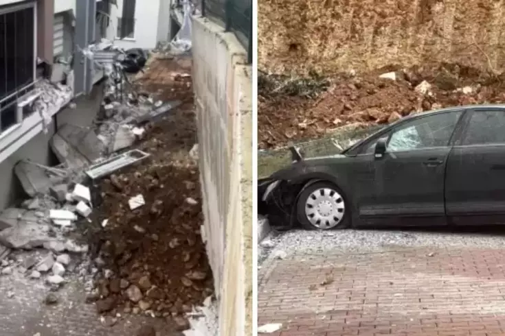 Faciadan dönüldü! İstinat duvarı araçların üzerine çöktü