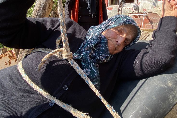 The 82-year-old woman has been reaching her home by a cable car with steel wires for 20 years.