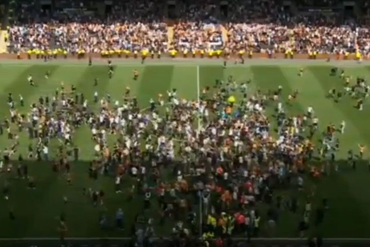 It's not a championship celebration! Hundreds of fans stormed the field as soon as the match ended.