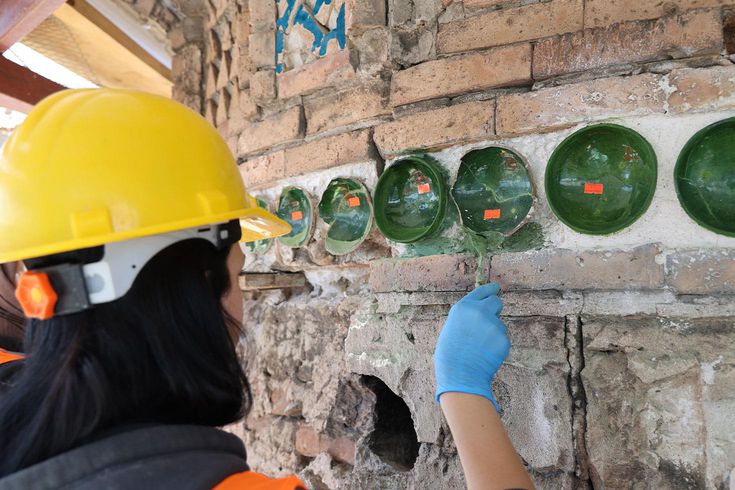The mystery of the mysterious green bowls in the 8-century-old mosque with the leaning minaret has been solved.