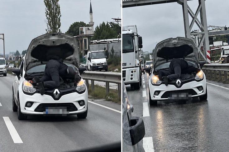 Trafikte akılalmaz görüntü! Seyir halindeki otomobilin motorunu tamir etti