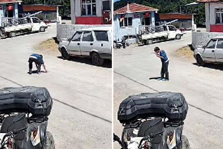 Yere düşen Atatürk portresini öpüp kaldırdı; o anlar kamerada
