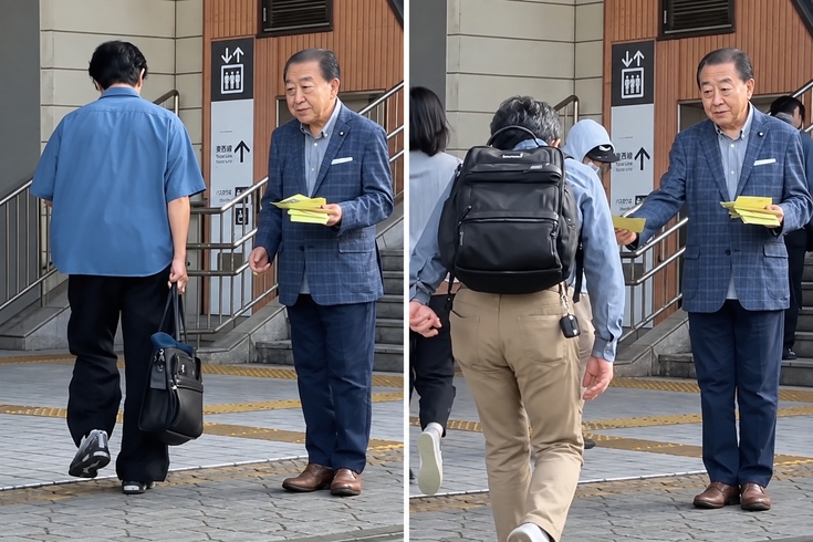 Japonya'nın eski başbakanı sokakta broşür dağıtırken görüntülendi