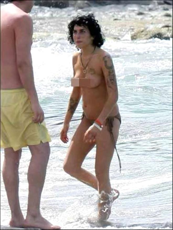 Amy winehouse topless on the beach of the day