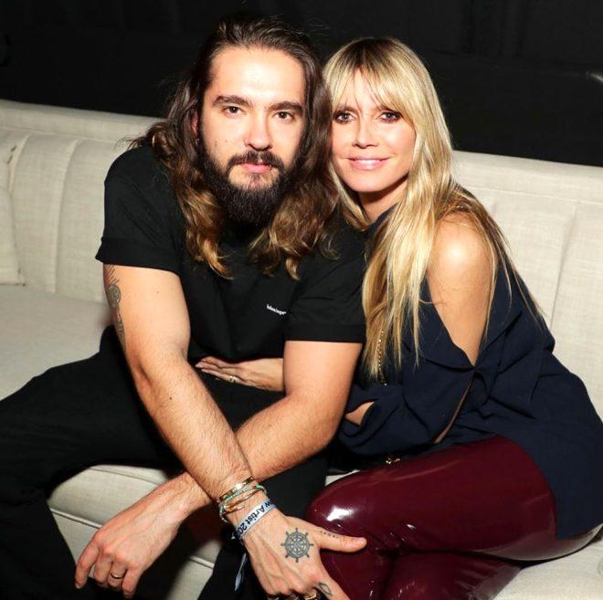 46'lık model Heidi Klum iç çamaşırı ve file çoraplarıyla saçlarını boyattı