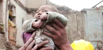 Nepal'de 4 Aylık Bebek 22 Saat Sonra Enkaz Altından Kurtarıldı